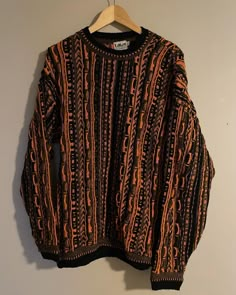 Fall Streetwear Jacquard Knit Sweater, Fall Jacquard Knit Sweater For Streetwear, 90s Black Sweatshirt For Fall, Vintage Sweater For Fall Streetwear, Vintage Fall Sweater For Streetwear, Orange Long Sleeve Retro Sweater, Orange Retro Long Sleeve Sweater, Fall Streetwear Knit Sweatshirt, Retro Graphic Print Sweater For Fall