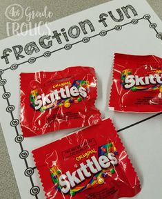 three packets of skittles sitting on top of a piece of paper with the word fraction fun