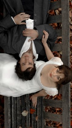 an overhead view of two people dressed in white