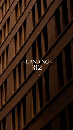 the landing at 322 logo is shown on an office building's side wall