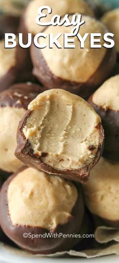 chocolate covered peanut butter balls stacked on top of each other with the words easy buckeyes in the middle