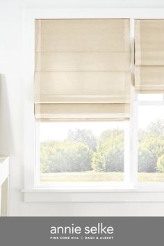 an image of a window with blinds in the room that is clean and ready for us to use