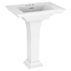 a white pedestal sink on a white background