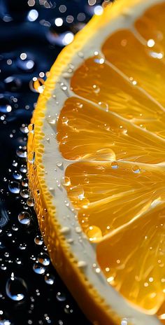 an orange slice with water droplets on it