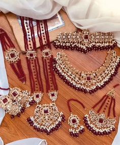 Prepare yourself for wedding season which is around the corner! Be happy while creating your royal looks and be on top of your style game in a room full of people. This bridal set is an example of perfection with extraordinary touch for someone beautiful like you!  Beautifully crafted in Hyderabadi ruby stones and gold plating for a royal look on your big day! Set included: necklace, choker , earrings , mang tikka , jhumar, mala , bracelet. In stock and ready to ship. color : maroon gold  Hand c Hyderabadi Jewelry, Mang Tikka, Earrings Kundan, Bridal Jewelry Sets Brides, Indian Bridal Jewelry Sets, Kundan Jewelry, Gold Jewelry Simple Necklace, Bridal Jewelry Set, Indian Jewelry Sets