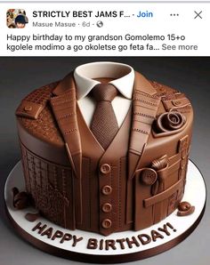 a birthday cake with a suit and tie on it