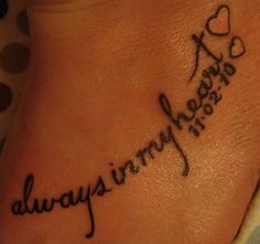 a foot with the words always in cursive writing on it