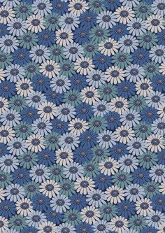 a blue and white flower pattern on fabric