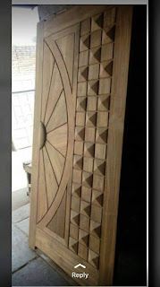 a wooden door with an intricate design on it