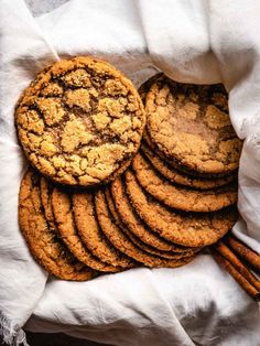 chocolate chip cookies and cinnamon sticks in a basket