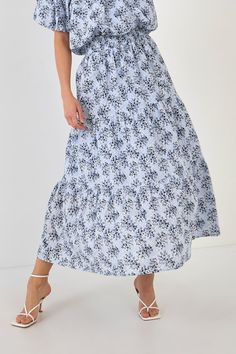 The perfect skirt for a summer day. This tiered maxi skirt is perfect for a summer day. With an elastic waistband and shirring throughout, it's comfortable and flattering. You'll love the pretty floral print too. Style this skirt with sandals or wedges for a casual look, or dress it up with a blouse and heels. Tiered maxi skirt Elastic waistband Shirring throughout Hand wash cold Do not bleach Do not tumble dry Iron low Shell: 100% Cotton Lining: 80% Polyester 20% Cotton TL645K Total lenght:37.5 Knit Loungewear, Strapless Bodycon Dress, English Factory, Tiered Maxi Skirt, Floral Maxi Skirt, Tweed Dress, Leather Dresses, Lace White Dress, Plus Dresses