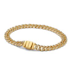 Elevate your look with the Pavé Cuban Chain Bracelet. This 14k gold-plated bracelet features sparkling links in a chain. The top of each half circle is set with three round stones, while the back of the chain is polished for shine and comfort. The bracelet closes with a flat, square-shaped clasp featuring an engraved Pandora logo. - Pandora Pavé Cuban Chain Bracelet - 14k Gold-plated unique metal blend / Cubic Zirconia / Clear - Sz. 7.9 in Charms Disney, Pandora Pave, Pandora Logo, Pandora Essence, Cuban Chain Bracelet, Pandora Gold, Bracelet Tennis, Bracelet Pandora, Half Circle