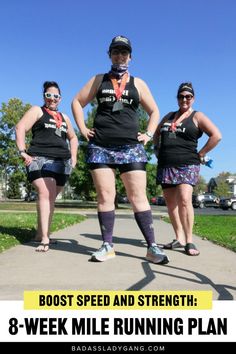 three women are standing on the sidewalk with their legs crossed and one is wearing running gear