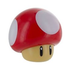 a red mushroom with white dots on it's head is shown in front of a white background