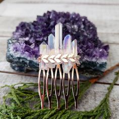 "Our quartz hair combs make a magical boho bridal hair piece! A shiny rose gold hair comb is adorned with aura quartz crystals and finished with a bar of chevron. These dainty boho hair combs are perfect for a pop of sparkle anytime you're feeling fancy af. - This listing is for (1) Hair comb - Rose gold plated brass hair comb OR Silver plated hair comb - Aura Quartz crystal stick - Each hair comb is a one of a kind - 2\" inches long X 1\" inch wide Designed and sold exclusively by WanderlustHea Boho Bridal Hair, Decorative Hair Combs, Hair Accessories Pins, Aura Quartz Crystal, Gold Hair Comb, Bridal Hair Piece, Crystal Hair Comb, Hair Accessories Boho, Boho Hair