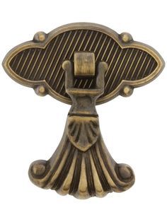 an antique brass door handle on a white background