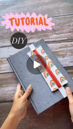 someone is making an origami book with scissors