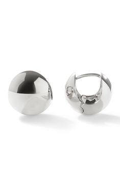 Minimal and understated, these silver sphere hoop earrings add a shimmering touch to any outfit. Lightweight and hypoallergenic, these silver sphere hoop earrings are the ideal everyday must-haves missing from your jewelry collection. This design is also available in gold. Lightweight sphere hoop earrings dipped in rhodium Comfortable to wear all day long Width: 12.87mm - 0.5" Depth: 11.5mm - 0.45" Weight: 1.9g Hoop Diameter: 12.5mm - 0.5" Post: Titanium Hinge Clasp Crafted In China Small Gold Hoops, Minimalist Silhouette, Free Earrings, Huggie Hoop Earrings, Wide Bands, Everyday Jewelry, Gold Plated Silver, Gold Hoop, Silver Hoop Earrings