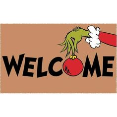 an image of a welcome sign with the grin on it's head and hands