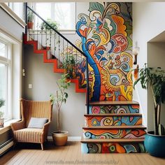 a stair case painted with colorful designs on the wall next to a chair and potted plant