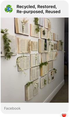 the wall is covered with many books and plants on it, as if they were recycled or re - purposed