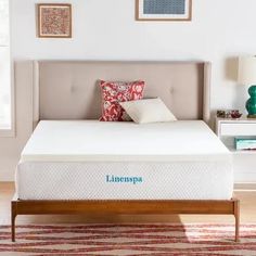 the linenspy mattress is on display in a bedroom