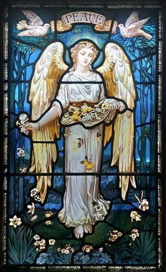 a stained glass window with an angel holding flowers