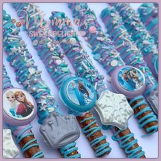 there are many frozen princess necklaces on display