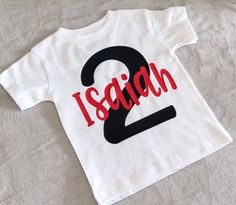 "Big Number 2 with your little one's name stretching across the front of the shirt! Cute Cool, and personalized just for your special day! Available on White, Black Or Gray Shirts in size 2t, 3t, and 4t! We can do the design in two of our 12 color options to add that extra personalization to your little ones shirt! Please select the color for your design from our color chart and leave that in the \"notes to seller\" section for us! --------------- All garments are top notch, retail quality, ring Two Birthday Shirt, Two Birthday, 2nd Birthday Boys, Birthday Boy Shirt, Black Birthday, 2 Birthday, Birthday Boy Shirts, Boy Shirt, Old Shirts