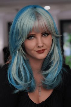 This lively hairstyle showcases a captivating blend of pastel blue hues, transitioning smoothly from a lighter, almost minty shade at the roots to deeper, richer blue tones at the tips. The straight-across bangs create a modern, edgy vibe, framing the face and drawing attention to the wearer's eyes. The soft waves cascading past - Click to see more of 30 Mesmerizing Hair Color Blends to Elevate Your Look and follow us for more hairstyle ideas. // Photo Credit: Instagram @artistic.aestheticss Hair Color Combinations, Shoulder Bob, Straight Across Bangs, Creative Hair Color, Creative Hair, Soft Waves, Golden Blonde, Creative Colour, Halloween Hair