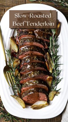 slow - roasted beef tenderloin on a white plate with rosemary garnish