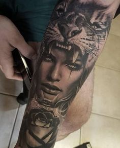 a woman with a tiger tattoo on her leg