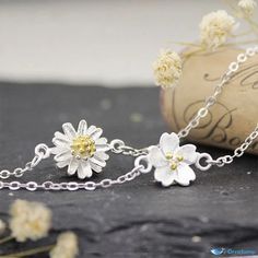 OrcaJump - Sakura Blossom Bracelets by Daisy: Exquisite Floral Jewelry for Elegant Styling Elegant Styling, Blossom Bracelet, Floral Jewelry, Floral Jewellery, Blossom, Daisy, Floral