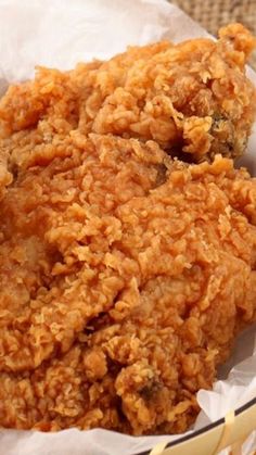 some fried food in a basket on a table