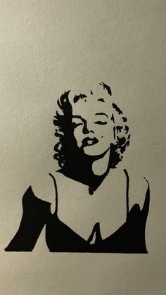 a stencil of marilyn monroe is shown in black ink on a white paper