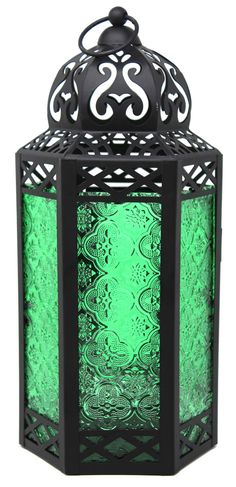 a green lantern with an intricate design on the front and sides, against a white background