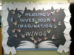 a bulletin board with butterflies and the words reading gives your imagination wings