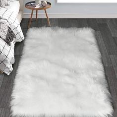 a white rug on the floor in a room