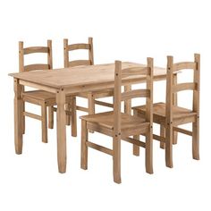 a wooden table with four chairs around it