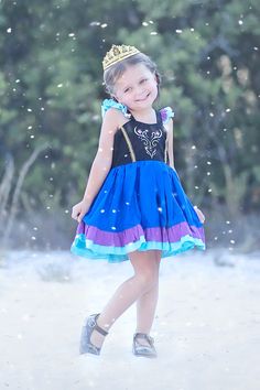 Girls Anna Dress Cute girls dress is Anna Inspired. Features gorgeous embroidery on the bodice, a pretty bow in back. Back is elastic. Anna Outfits Disney, Anna Inspired Dress, Anna Dresses Frozen, Anna Dress Frozen 2, Anna Tutu Dress, Anna Outfit, Dress Birthday Party, Frozen Dress, Anna Dress