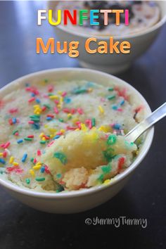 a bowl filled with cake and sprinkles on top of a table next to another bowl