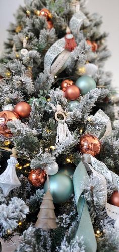 a decorated christmas tree with ornaments on it