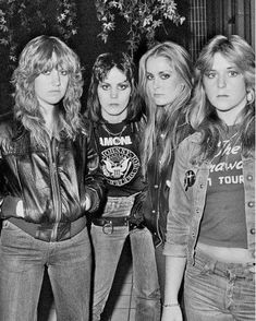 the runaways posing for a photo in their leather jackets