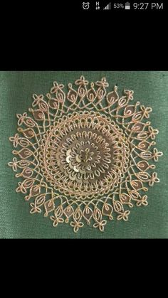 an image of a doily on a green cloth