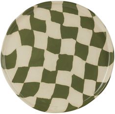 a green and white checkered plate on a white background