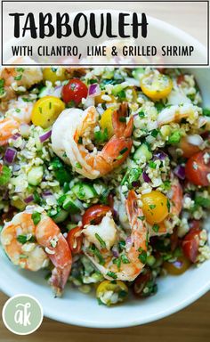 tabbouleh with cilantro, lime and grilled shrimp in a white bowl