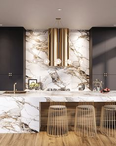 an instagramted photo of a kitchen with marble countertops and bar stools