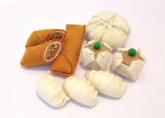 there are several pieces of felt that look like pumpkins