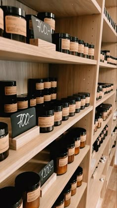 the shelves are filled with many different types of jars