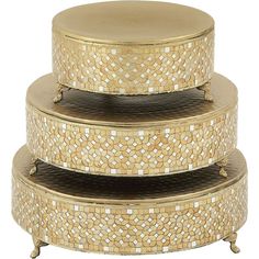 three tiered trays are stacked on each other